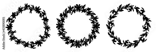 Set of vector wreaths in black ink on a white background. Flowers and herbs are hand-drawn. Anemone, primrose, snowdrop. Botany and flora. Round design for medicine, postcards, cosmetics.