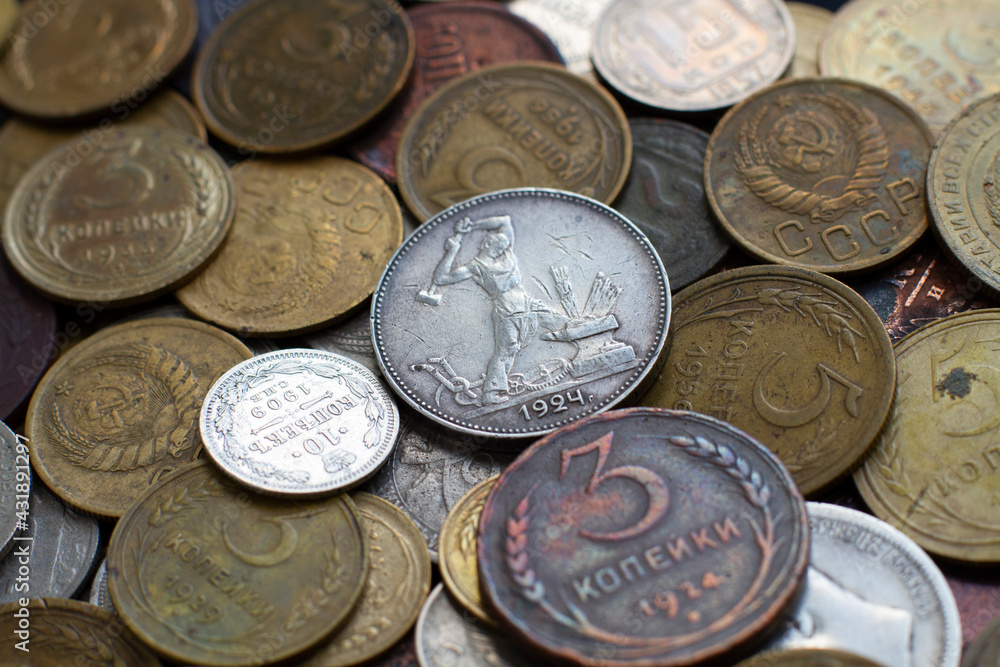 Background from old money of Imperial Russia. 19 - 20 century.Vintage multi-colored Russian coins (translation: Kopeck) Background from old money of Imperial Russia. 19 - 20 century.Vintage multi-colored Russian coins (translation: Kopeck)