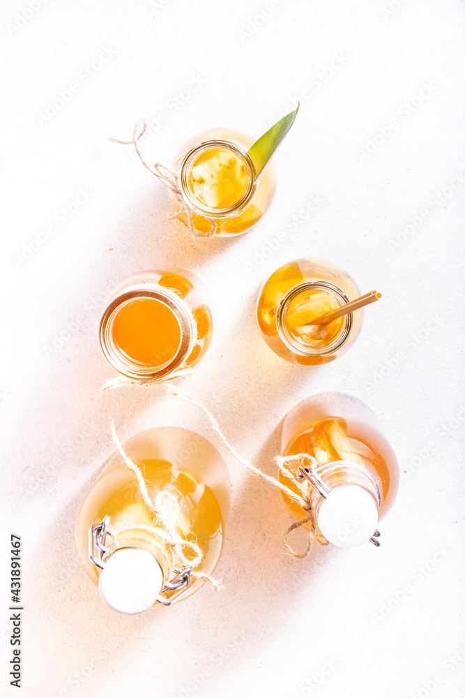 Homemade Fermented Raw Kombucha Drinks In Bottles. Gray Table Background. Top view