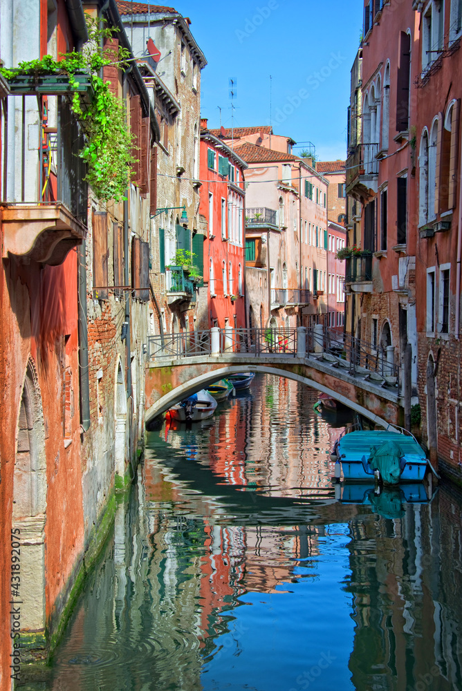 Fototapeta premium A small canal in Venice, Italy