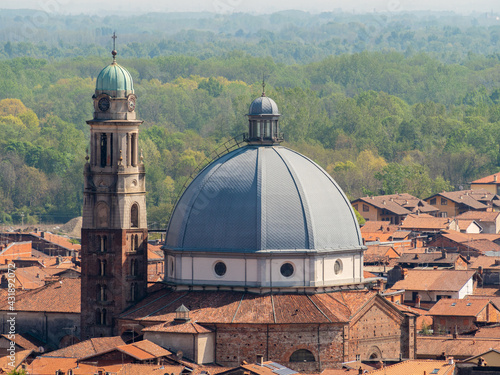 Canvas-taulu Ancient Saint Peter church and buildings with red tile roofs in Gattinara, Italy