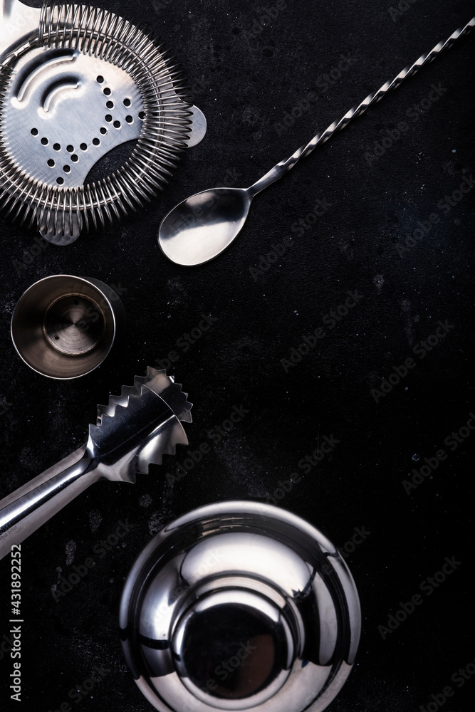 Steel bar tools and accessories for making cocktail. Shaker, jigger, strainer, spoon, tongs, muddler. Alcohol drink and beverages preparation - obrazy, fototapety, plakaty 