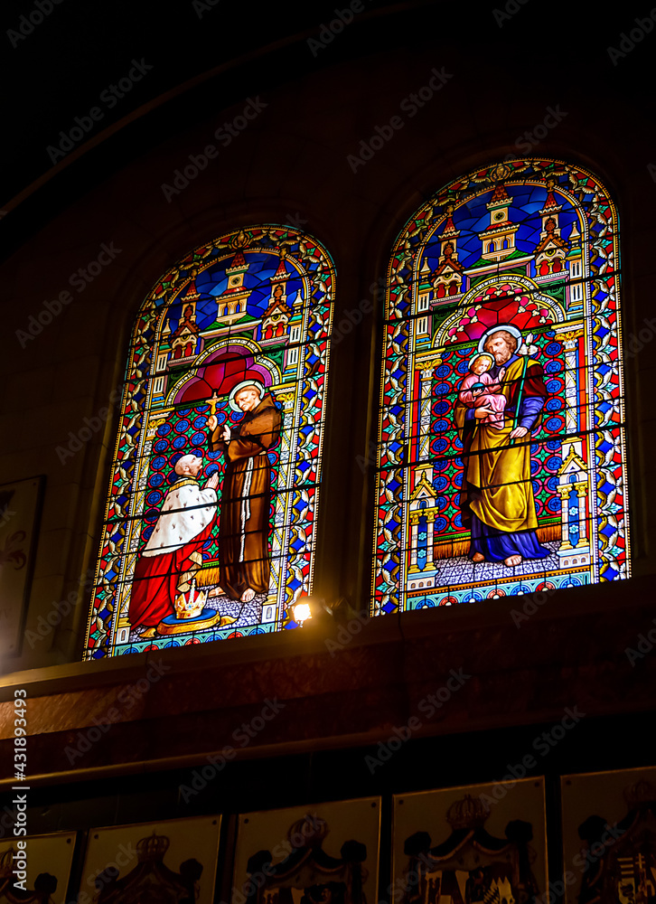 Jerusalem, Israel - 28 April 2021: Thestained glass in the Austrian Hospice of the Holy Family, a refuge for itinerant pilgrims, was opened in 1854 by the Catholic Church of Austria in the Holy Land.