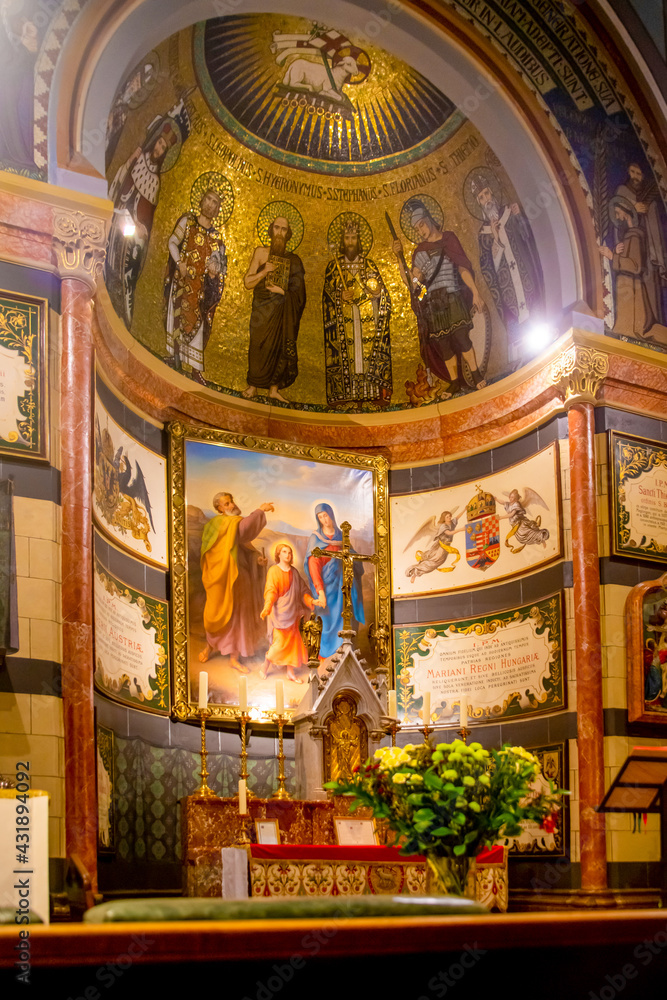Obraz premium Jerusalem, Israel - 28 April 2021: Inside the home church Austrian Hospice of the Holy Family - chapels. In her altar there is an image of the Holy Family.