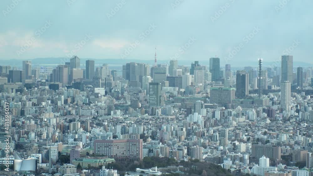 TOKYO, JAPAN : Aerial high angle sunset CITYSCAPE of TOKYO. View of buildings around Shinjuku and Minato ward. Japanese city life, business and urban metropolis concept shot. Real time fixed shot. TOKYO, JAPAN : Aerial high angle sunset CITYSCAPE of TOKYO. View of buildings around Shinjuku and Minato ward. Japanese city life, business and urban metropolis concept shot. Real time fixed shot.