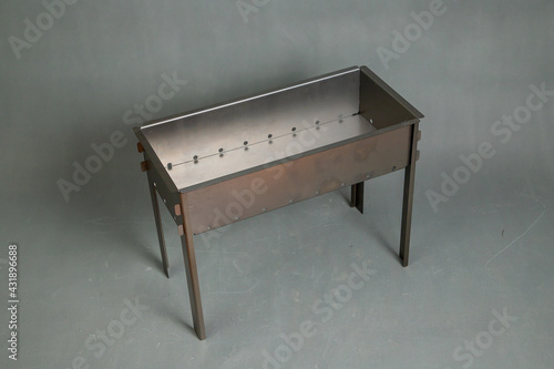 Not a large collapsible barbecue on a gray background.