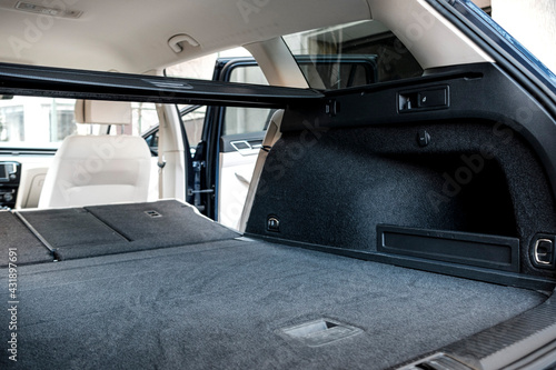 Car trunk. Open trunk. Seat of the second row of seats. Organizer in the trunk.