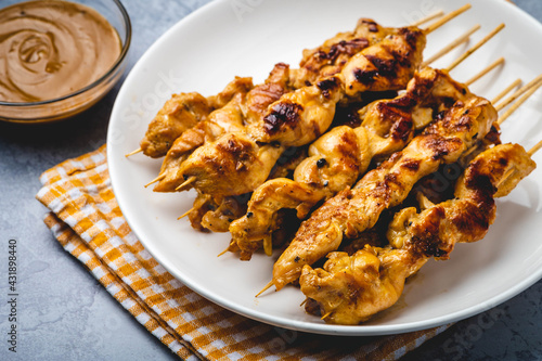 Famous Asian Chicken Dish- Chicken Satay with Peanut Sauce on the side- full profile