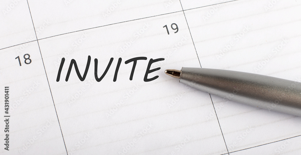 Text INVITE on calendar planner to remind you an important appointment with a pen on isolated white background. Text INVITE on calendar planner to remind you an important appointment with a pen on isolated white background.