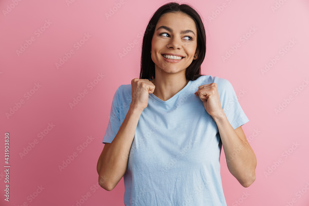 Excited hispanic woman gesturing and laughing at camera Excited hispanic woman gesturing and laughing at camera