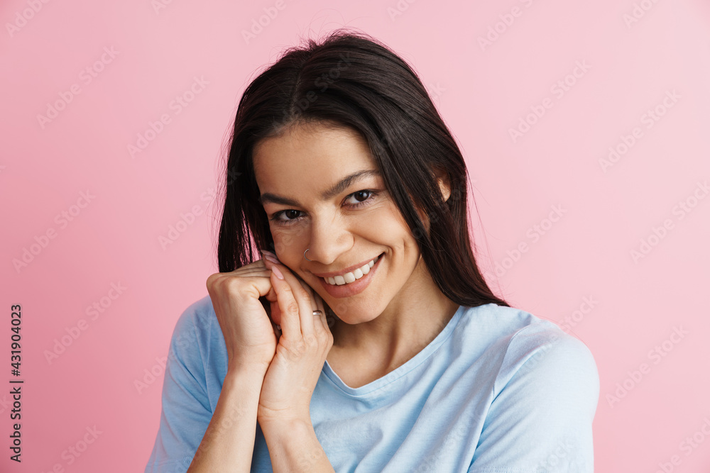 Brunette hispanic woman smiling and looking at camera Brunette hispanic woman smiling and looking at camera