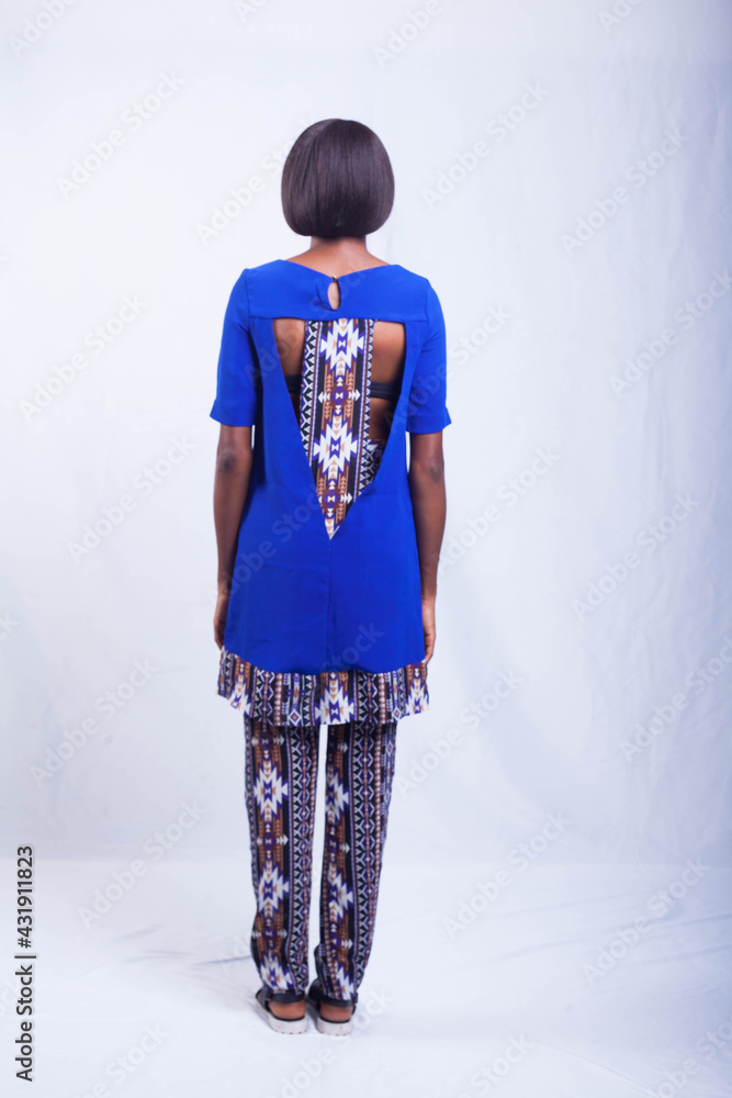 Female fashion model modelling brightly coloured clothes Female fashion model modelling brightly coloured clothes