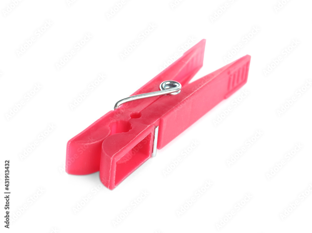 Bright pink plastic clothespin isolated on white Bright pink plastic clothespin isolated on white
