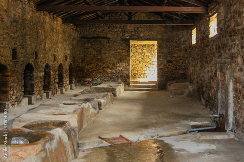 Slika na platnu Ancient stone washhouse (launderette - laundry room) in Tepekoy village, Gokcead