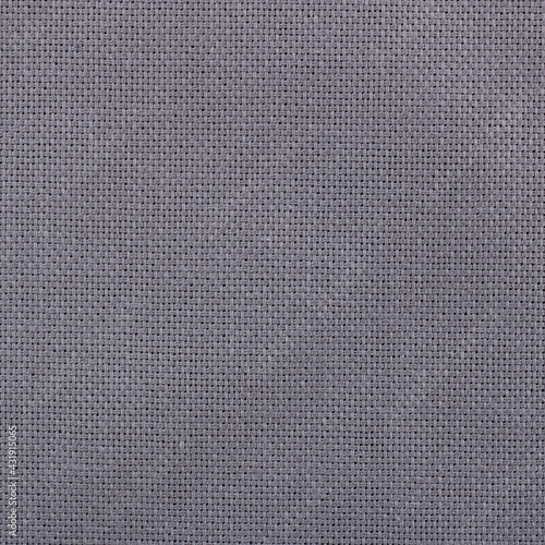 Texture of natural linen fabric close up. Gray dark linen textile