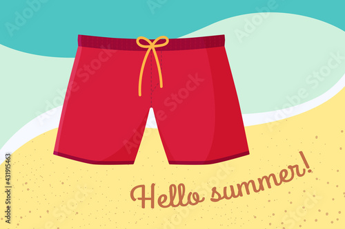 Men's swimming trunks. Red shorts on a background of sea water and sand. Hello summer. Swimming suits for vacation