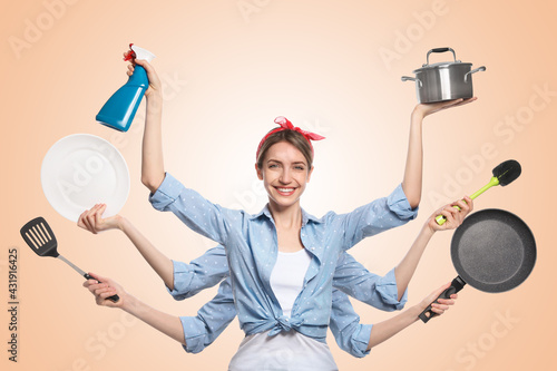 Fototapeta Multitask housewife with many hands holding different stuff on beige background