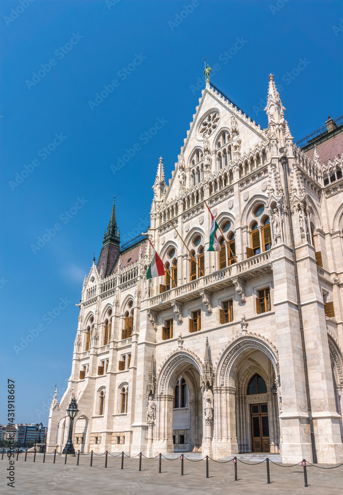 Budapest, Hungary - August 31, 2019: majestic facade of the Hungarian Parliament building, built in the neo-Gothic style. Famous state building and most popular tourist attraction in Budapest