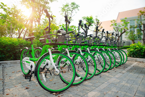 Wallpaper Mural App rent bicycles for city bike-sharing, parking in a public area in University. concept of eco-friendly healthy active lifestyle, business transport Torontodigital.ca