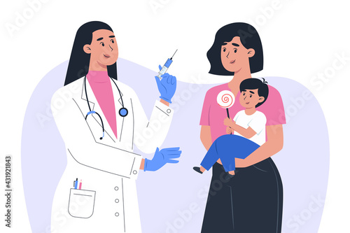 A female doctor in a mask and gloves makes a vaccine to a a child patient