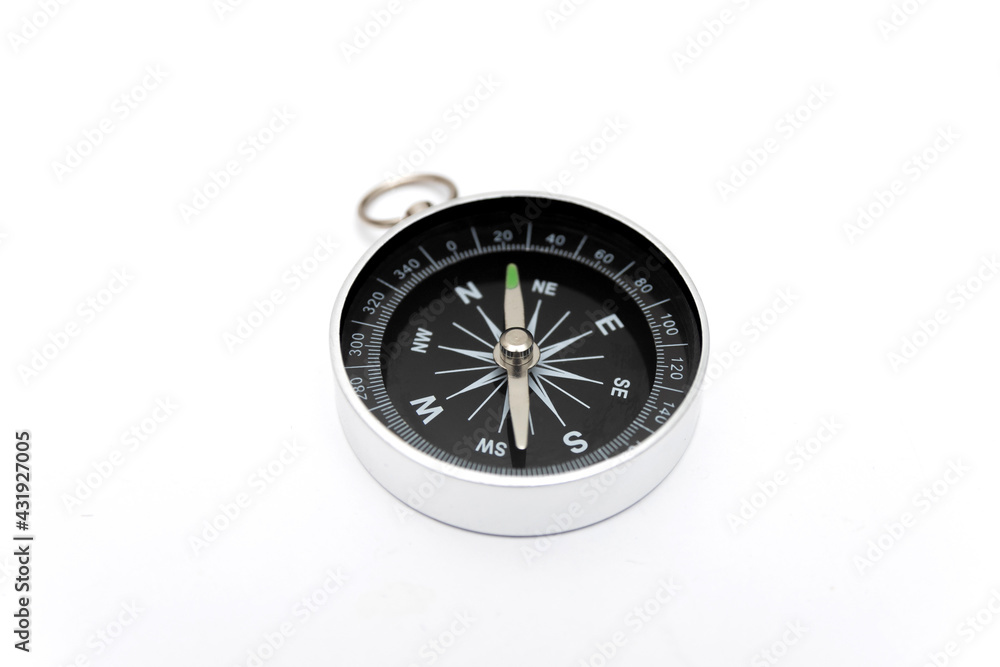 Compass close-up isolated on white background. Compass close-up isolated on white background.