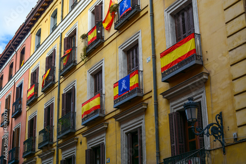 Madrid, Spain - October 25, 2020: Buildings decorated with flags in Madrid downtown