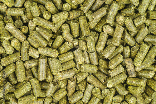 Alfalfa pellet. Food background photo