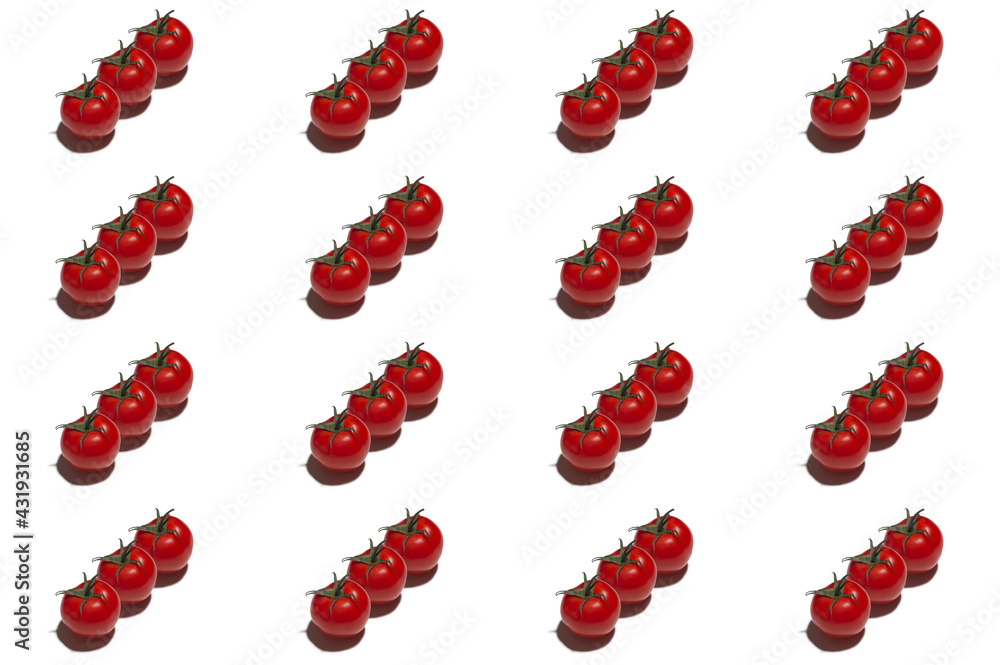 Pattern from three red ripe tomatoes on a white background. Pattern from three red ripe tomatoes on a white background.