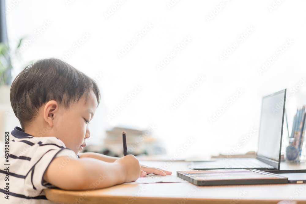 E-learning, online education at home.Online education.Distance learning, Asian kid child school boy online learning with laptop.Smart kid listen teacher talk.Success, drawing kid homeschool Student. E-learning, online education at home.Online education.Distance learning, Asian kid child school boy online learning with laptop.Smart kid listen teacher talk.Success, drawing kid homeschool Student.