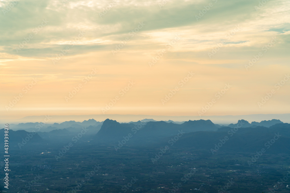 Sunrise at mountain cliff with mountain background. Nature park and outdoor landscape background Sunrise at mountain cliff with mountain background. Nature park and outdoor landscape background