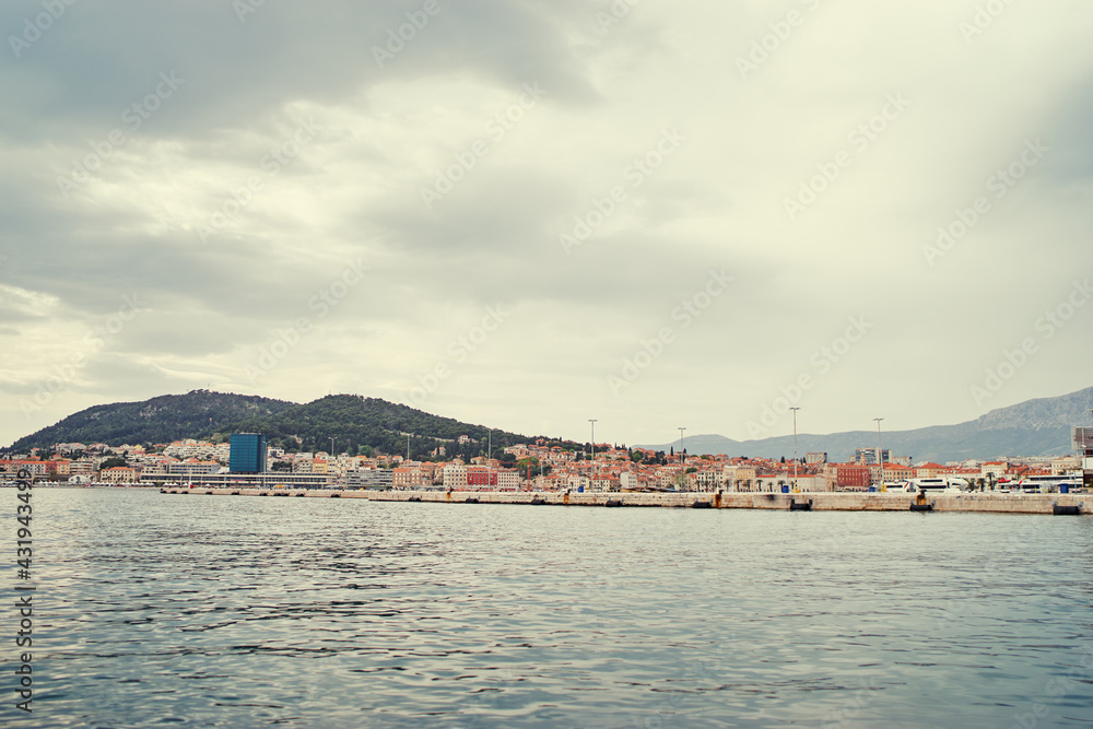 Travel by Croatia. Beautiful landscape with Split Old Town and sea promenade. Travel by Croatia. Beautiful landscape with Split Old Town and sea promenade.