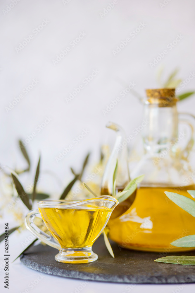 Olive branch and olive oil bottle isolated on white. Olive branch and olive oil bottle isolated on white.