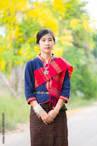 Portrait of asian girl with Thai local traditional dress, famous in countryside of Thailand,Ladies in traditional Thai costume in handmade flower baskets. Thailaind photo