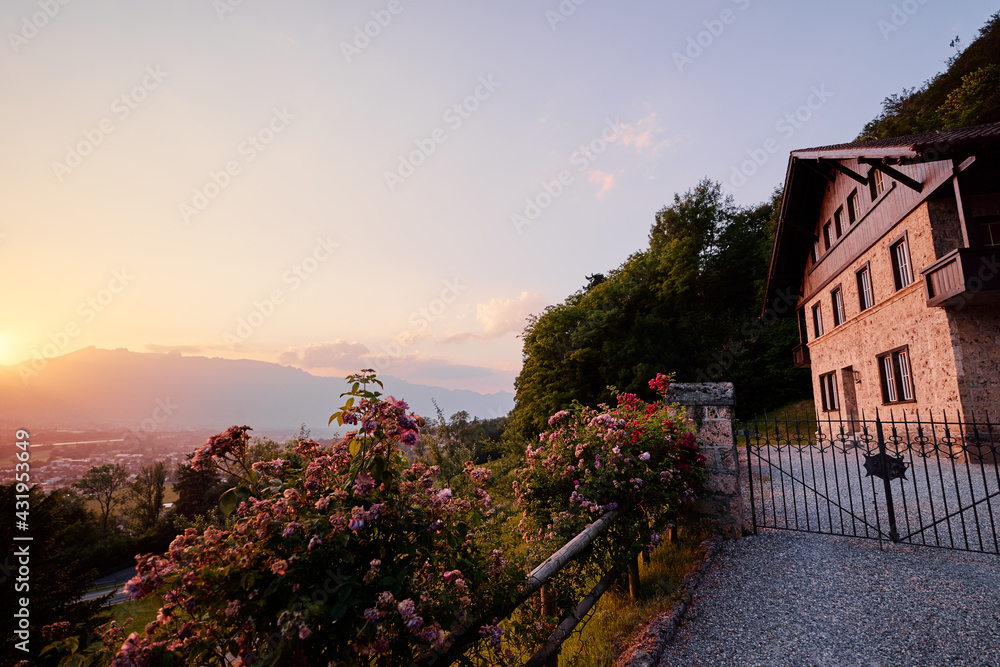 Old brick house with wonderful sunset mountain view, Lichtenstein. Old brick house with wonderful sunset mountain view, Lichtenstein.