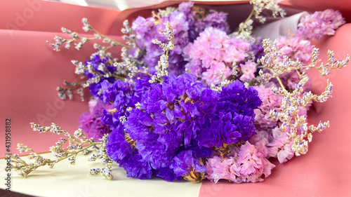 Statis dried flowers in the bouquet. The meaning of the statis flower depends on the occasion or event, but there are some commonly accepted meanings for statice. Remembrance, Sympathy, Success