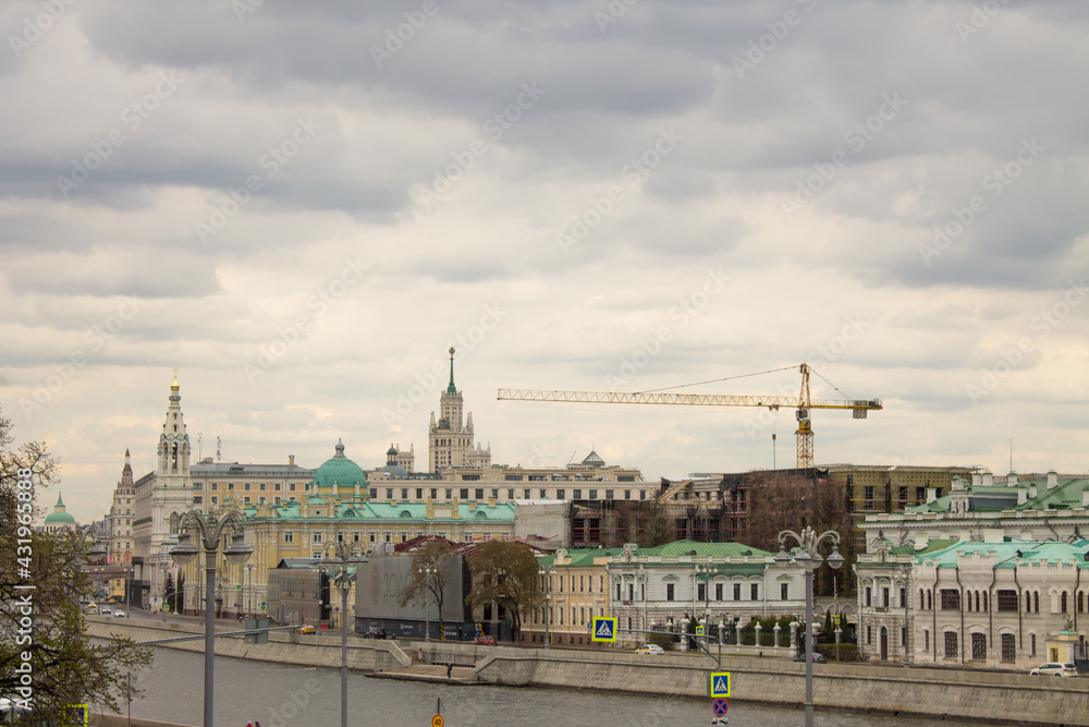 panoramic view of the Moskva River and the Sofia embankment with historical buildings against a cloudy sky and space to copy. Concept - famous place in Moscow Russia
