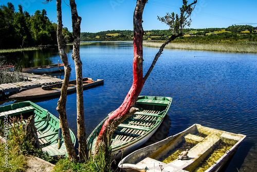 old boats on the lake chiloe chile