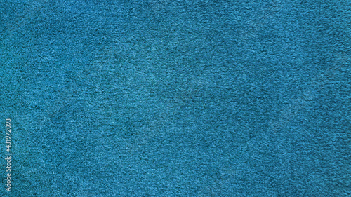 bright blue soft velvet fabric texture used as background. empty blue or cyan fabric background of soft and smooth textile material.