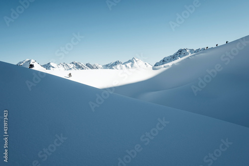 Steinkarspitze mountain covered with snow against sky, Lechtal Alps, Tyrol, Austria photo