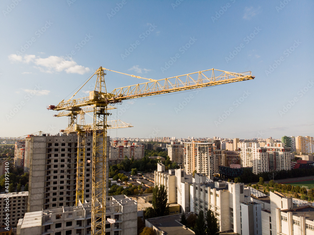 Building tower crane building a house