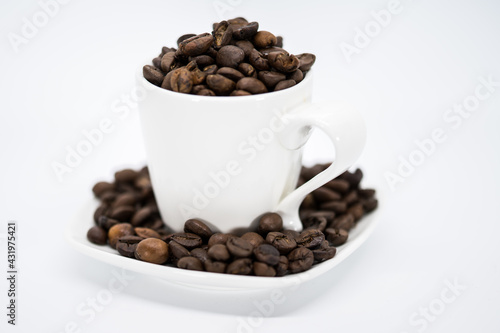 Espresso cup with coffee beans