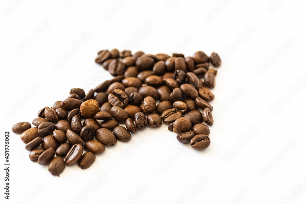 coffee beans on a white background in the shape of an arrow. coffee direction. coffee beans on a white background in the shape of an arrow. coffee direction.