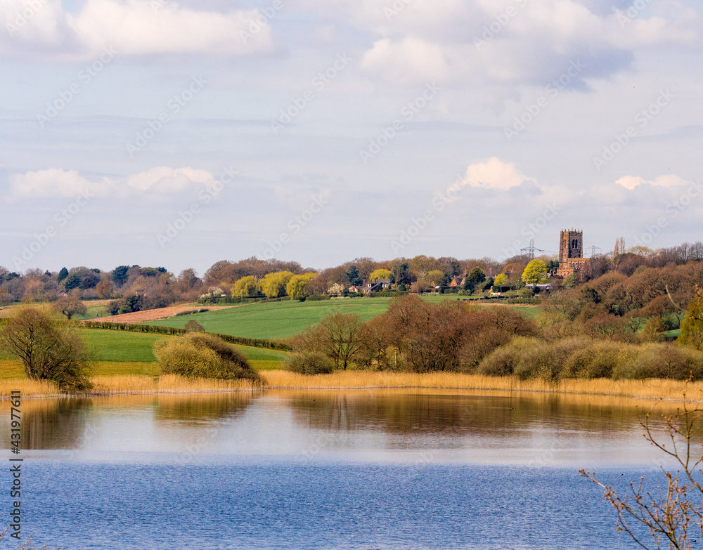 Early springtime sunshine on Pickmere Lake, Pickmere, Knutsford, Cheshire, UK Early springtime sunshine on Pickmere Lake, Pickmere, Knutsford, Cheshire, UK