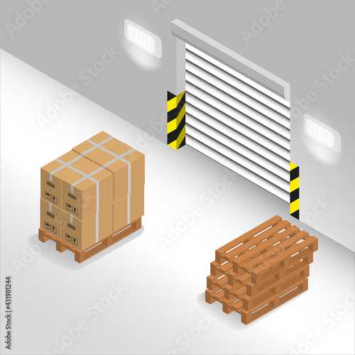 A set of boxes stands on a pallet near the gate.