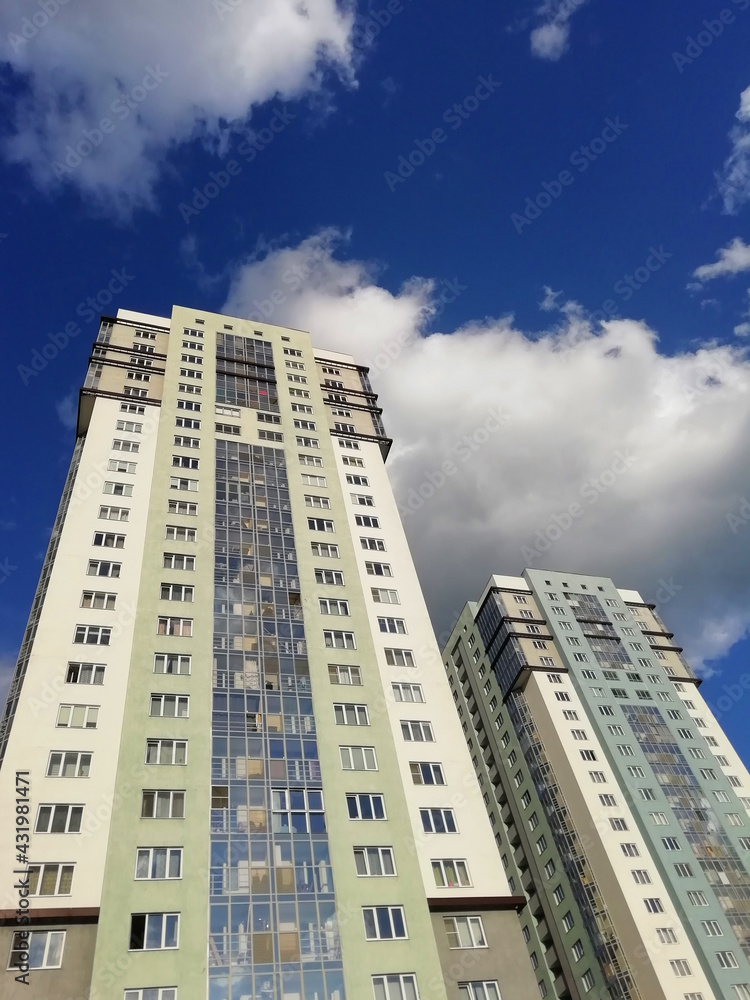 Yekaterinburg, Russia -01.05.2021: Modern residential high-rise buildings in Russia. Real estate background. Real estate market concept. Apartment building. New builded residential building. Yekaterinburg, Russia -01.05.2021: Modern residential high-rise buildings in Russia. Real estate background. Real estate market concept. Apartment building. New builded residential building.