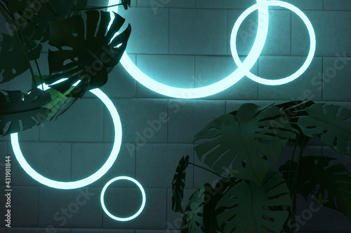 Silhouette plants against illuminated circle shape lights on brick wall