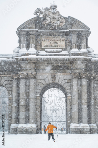 Alcala Gate during heavy snowfall at Madrid, Spain photo