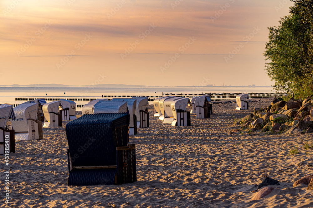 Abundance of deck chair on beach during sunset at Usedom, Mecklenburg-vorpommern, Germany Abundance of deck chair on beach during sunset at Usedom, Mecklenburg-vorpommern, Germany