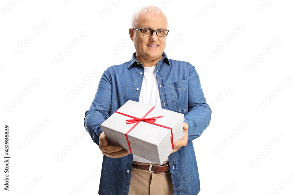 Smiling mature man with white hair holding a present box Smiling mature man with white hair holding a present box