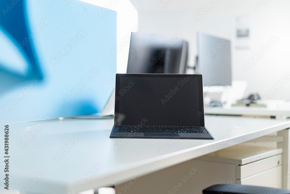 Digital tablet on desk at place of work Digital tablet on desk at place of work